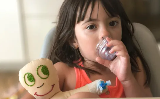 Carla testimony autism Child Life Carla, a child with autism, with a Child Life doll